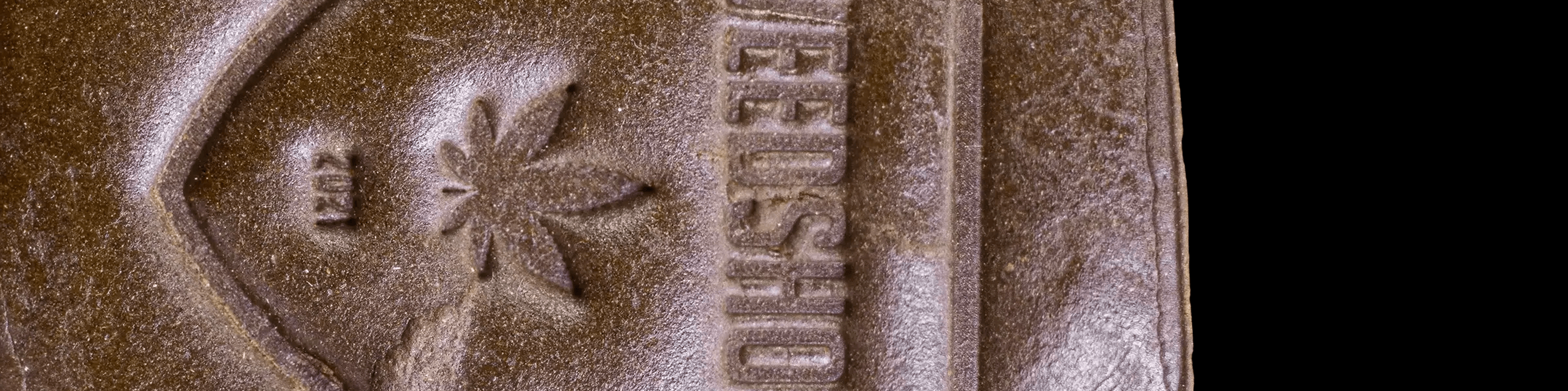 Pressed hash blocks in warm brown tones with a slightly rough, compact surface.