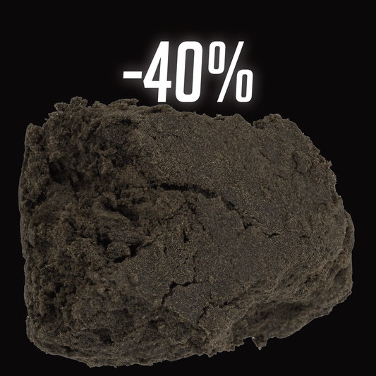 Dark brown hash with a 40% discount label on a black background cbd