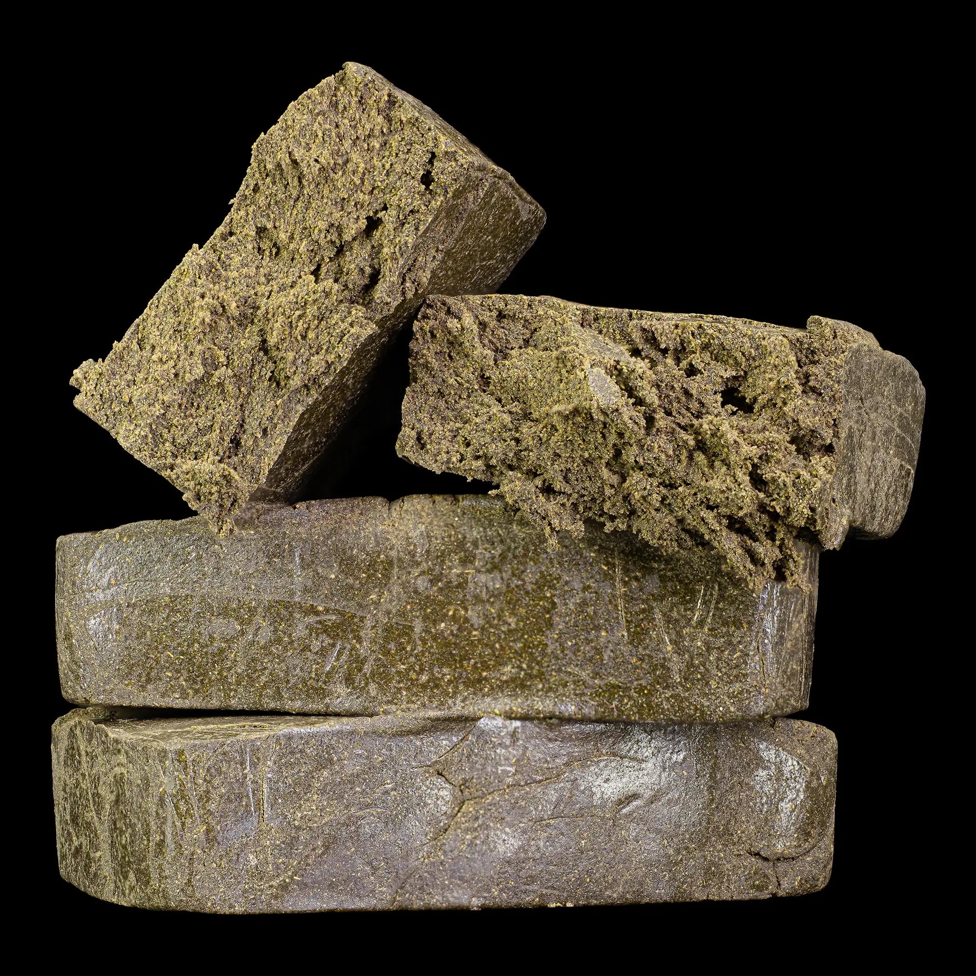 Manali Cream 40% THCA hand pressed dry sift hash with oily resin surface