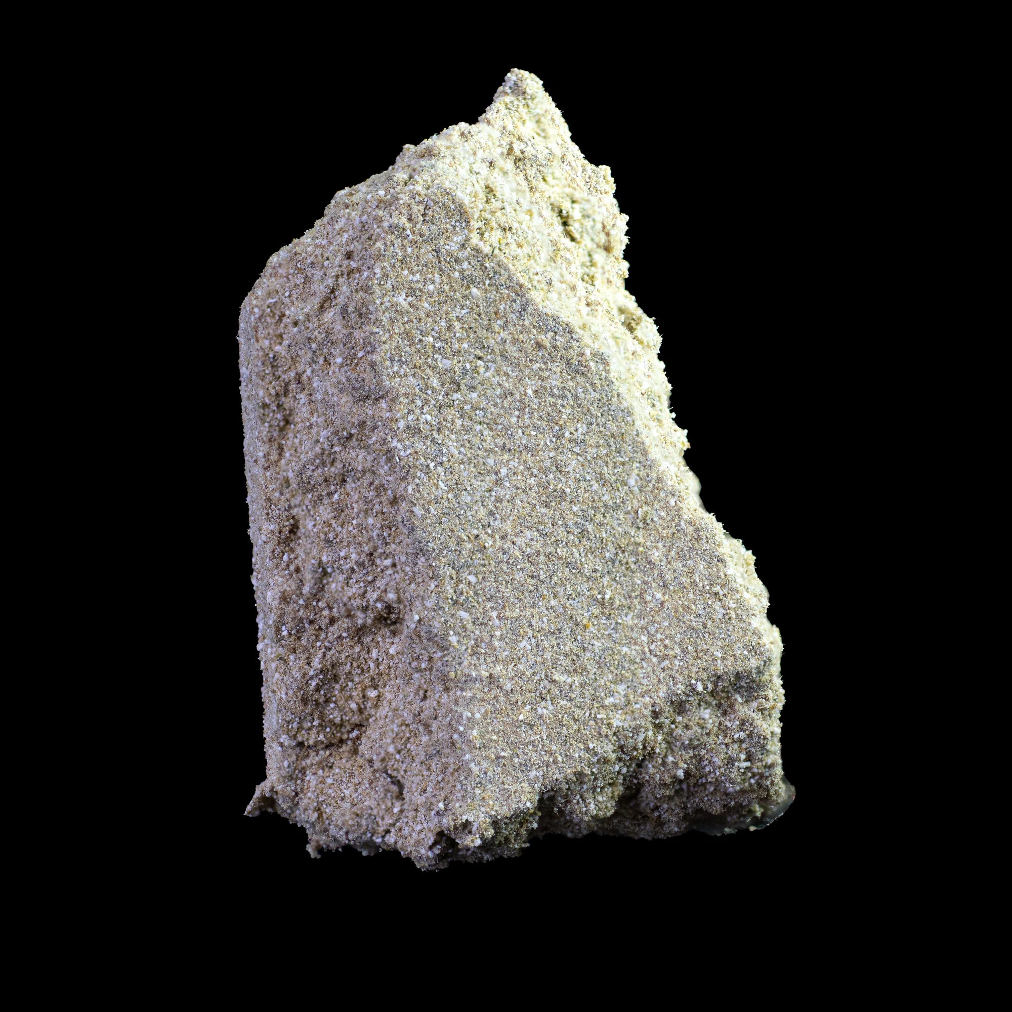 Detaljeret close-up af Super Pollen-hash, hvor den karakteristiske fine og glinsende struktur tydeligt fremstår. Den varme, gyldne tone dominerer billedet.