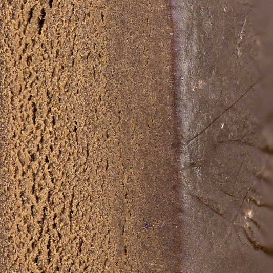 Close-up of hash thca with a textured pattern